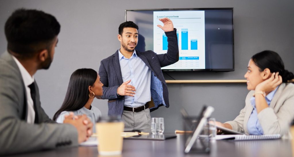 10 Dynamic Mentorship Programs Igniting Professional Growth 2 this should help our case shot young businessman giving presentation