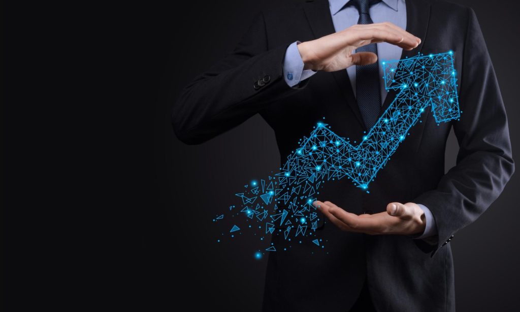 Professional Development: Investing in Yourself for Lifelong Success 1 businessman hold graph arrow positive growth icon pointing creative business chart with upward arrows financial business growth concept low polygonal increased sales increased value 1 1