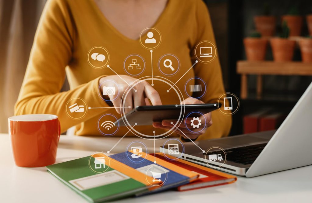 Exploring in Online Learning Platform Support Services 3 social media marketing virtual icons screen business women typing keyboard with laptop computer tablet office
