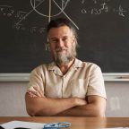 vertical-photo-cheerful-teacher-looks-at-the-came-2022-01-18-23-55-31-utc.jpg
