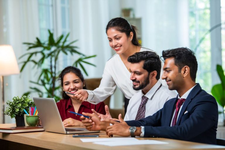 For Corporates 2 smiling team discusses business in bright modern o 2026 03 17 00 45 39 utc